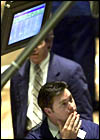 Traders watching the markets (AP)