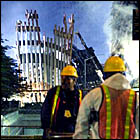 Workers in front of the World Trade Centre ruins (AP)