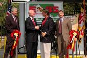 Energy Secretary Samuel Bodman and Maryland Governor Robert Ehrlich shake hands at the opening of Marylands first State-owned E-85 fueling facility.