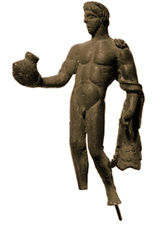 Photograph of a metal statuette in the shape of a man with one arm out, holding a pot