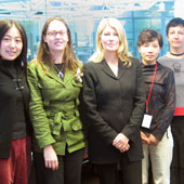 Ms Wang Fang and Ms Yang Lingxue with members of the Library's Web Unit