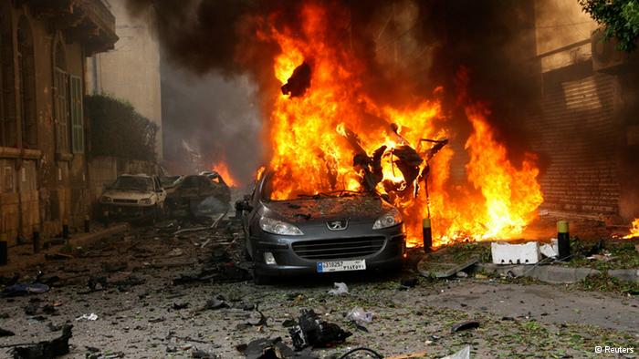 A car ablaze after the bombing