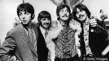 19th May 1967: The Beatles celebrate the completion of their new album, 'Sgt Pepper's Lonely Hearts Club Band', at a press conference held at the west London home of their manager Brian Epstein. 