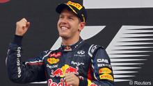 Red Bull Formula One driver Sebastian Vettel of Germany celebrates winning the South Korean F1 Grand Prix REUTERS/Kim Hong-Ji ( 