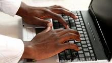 hands typing an email