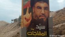 Plakat von Hassan Nasrallah, Generalsekretät der Hisbollah (Foto: Mona Naggar)