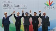 (L-R) Brazil's President Dilma Rousseff, Russian President Dmitry Medvedev, India's Prime Minister Manmohan Singh, Chinese President Hu Jintao and South Africa's President Jacob Zuma pose for a photograph during the BRICS summit in New Delhi March 29, 2012. REUTERS/Yekaterina Shtukina/RIA Novosti/Kremlin (INDIA - Tags: POLITICS) THIS IMAGE HAS BEEN SUPPLIED BY A THIRD PARTY. IT IS DISTRIBUTED, EXACTLY AS RECEIVED BY REUTERS, AS A SERVICE TO CLIENTS