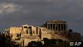 In this photo taken Sunday, Sept. 5, 2010, the elegant marble temple of Athena Nike, distinguished by its four Ionic columns, is lit by the sun as the Propylaea gate is seen on the left and the Parthenon temple in the shade on the right, on the Athens Acropolis. A ten-year restoration project has just been completed on the 2,400-year-old temple, which was dismantled to ground level and rebuilt to correct damage from ground subsidence and rusting internal joints. (ddp images/AP Photo/Petros Giannakouris)