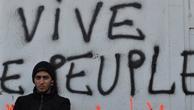 grafitti reading Vive le peuple or long live the people
