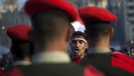 A protester faces off against Egyptian army military police 
