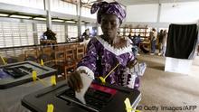 A woman casts her vote In the 12007 presidential (Photo: ISSOUF SANOGO/AFP/Getty Images) 