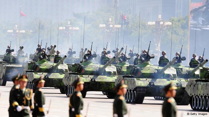 Chinese People's Liberation Army (PLA) tanks rumble past Tiananmen Square during the National Day parade in Beijing on October 1, 2009. AFP PHOTO/FREDERIC J. BROWN (Photo credit should read FREDERIC J. BROWN/AFP/Getty Images) 
