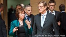European High Representative for Foreign Affairs and Security Policy Catherine Ashton (L) chats with German Foreign Minister Guido Westerwelle (R) Wiktor Dabkowski
