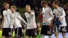 Germany's Per Mertesacker (L-R) Andre Schuerrle, Bastian Schweinsteiger, Jerome Boateng and Thomas Mueller celebrate after winning the FIFA World Cup 2014 qualifying soccer match between Ireland and Germany at Aviva stadium in Dublin, Ireland, 12 October 2012. Photo: Federico Gambarini/dpa
