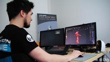 Game design student Julian works on the development of a new game
