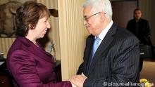 A handout photograph provided by the Palestinian Authority shows Palestinian President Mahmoud Abbas meeting with European Union Foreign and Security Policy Chief Catherine Ashton 