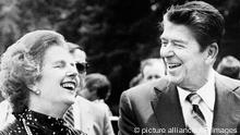 FILE - U.S. President Ronald Reagan, right, and Britain's Prime Minister Margaret Thatcher share a laugh . (AP Photo/File) 