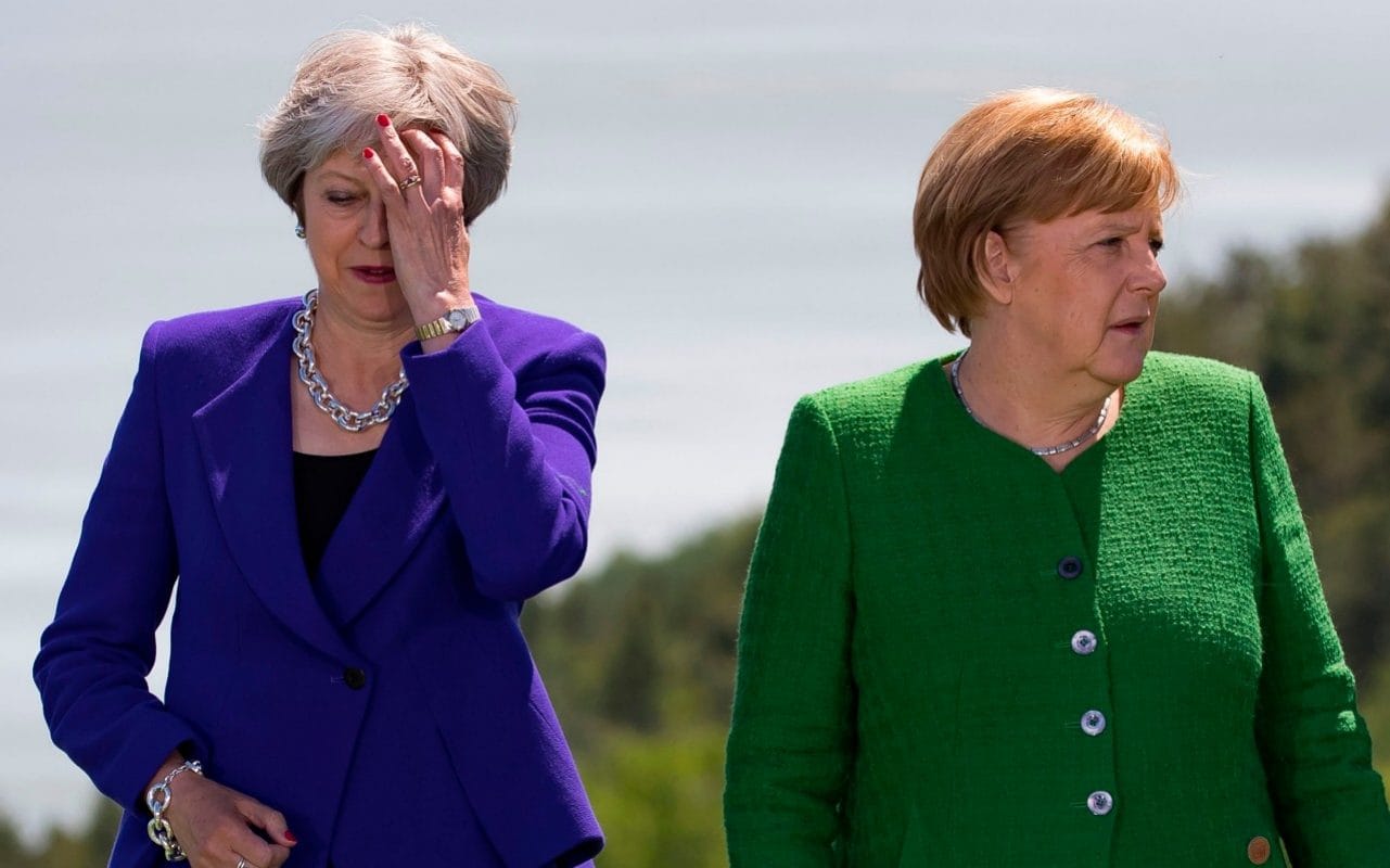 Theresa May and Angela Merkel at the G7 summit in Canada