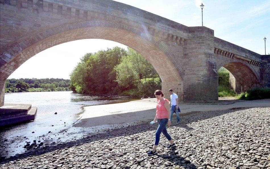 The River Tyne at Corbridge where people can walk on the exposed river bed